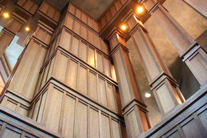 View of colonnade in stairwell and integrated fiber optic lighting between columns