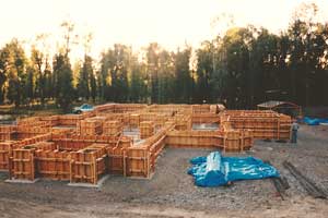 Custom-formed foundation walls