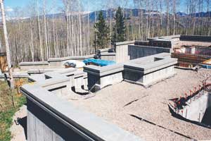Foundation with monolithic architectural concrete caps