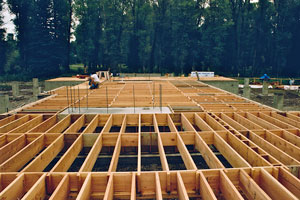 Precision compression loaded floor framing