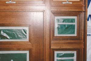 Grain-sequenced rift-sawn white oak architectural doors and windows at finishing phase
