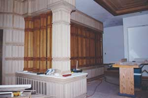 Millwork installation phase using precision industrial table saw