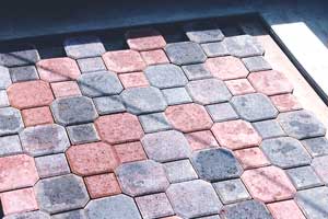 Pavers with architectural concrete borders