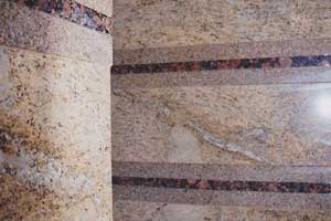 Laminated granite shower with three types of granite