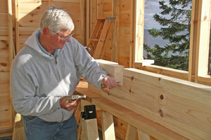 Chiseling sloped pocket at a carrier beam