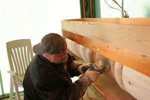 Using small grinder to sand down to final shape